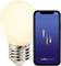 A smart light bulb next to a smartphone displaying the Nordlux Smart app interface, indicating home automation technology.