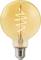A glowing vintage-style light bulb with a visible spiral filament inside a round glass enclosure.