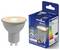 A smart LED light bulb and its packaging are shown. Packaging displays energy ratings, Bluetooth symbol, and text including 'nordlux'.