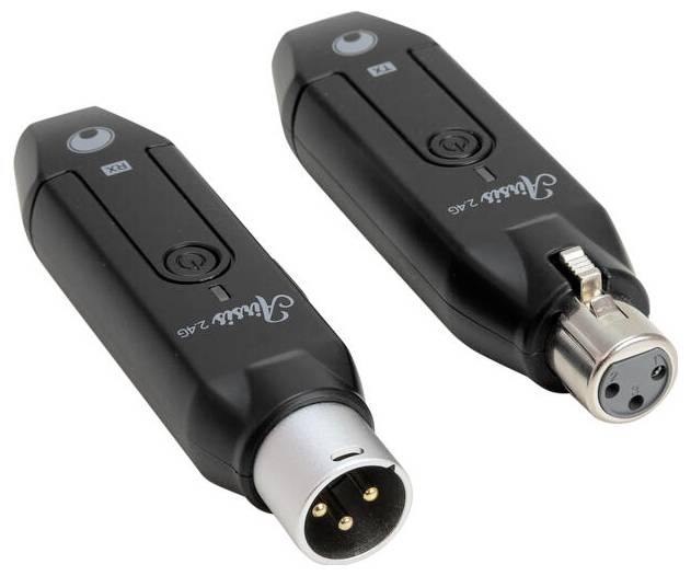 Two black wireless audio transmitters with XLR connectors on white background.