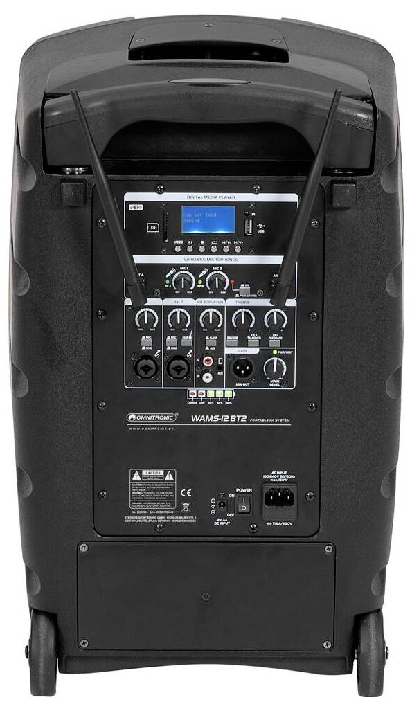 'Rear view of a portable speaker featuring control panel, knobs, and input ports, with wheels and handle for mobility.'