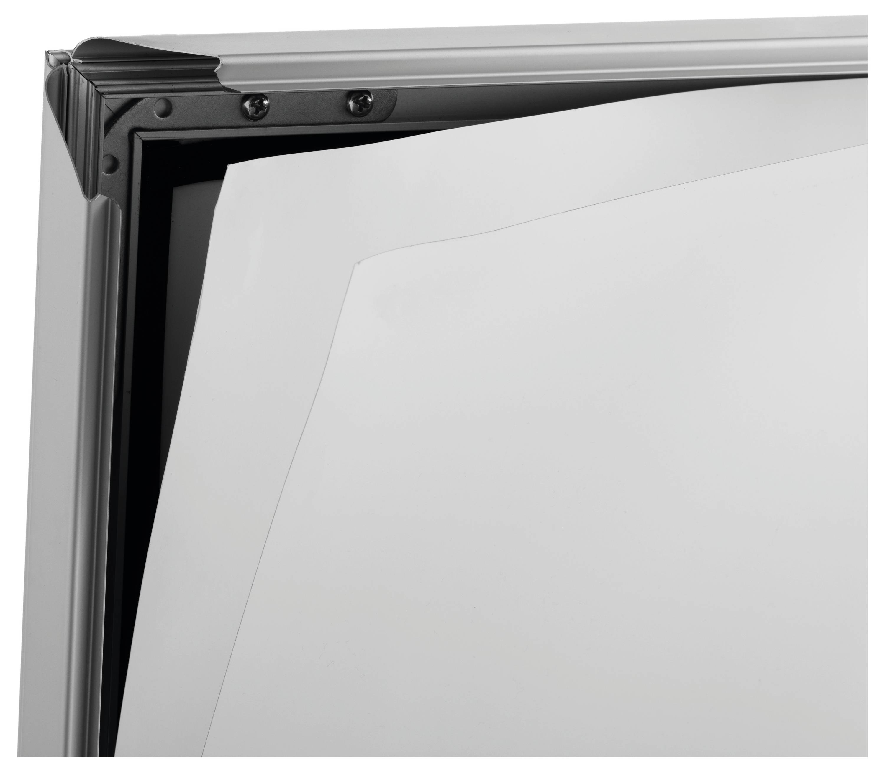 A close-up of a metal frame with a partly inserted white sheet, showcasing the corner detail and border design.