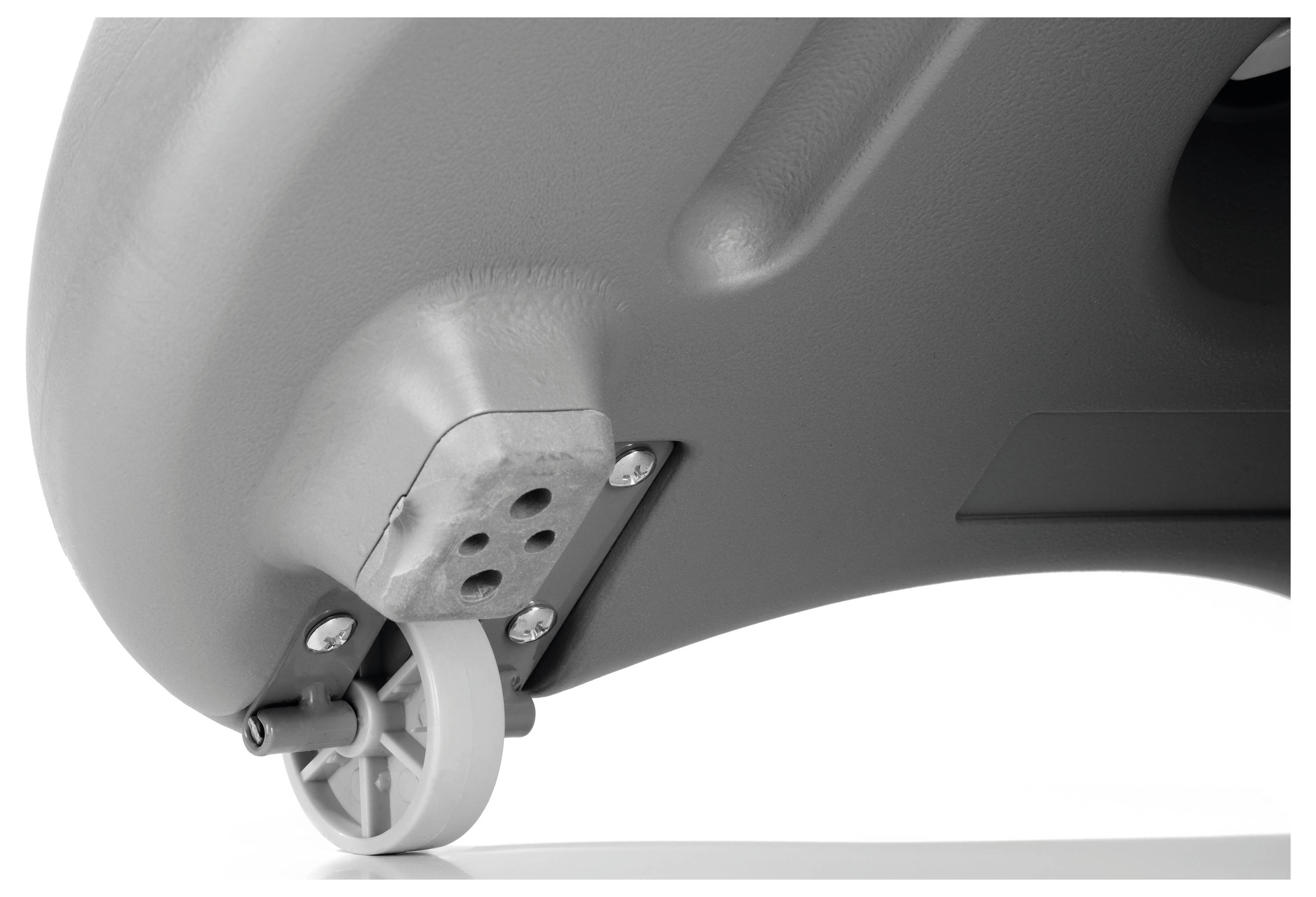 The image shows a close-up of a gray plastic object with a small caster wheel attached to the bottom, highlighting its mobility feature.