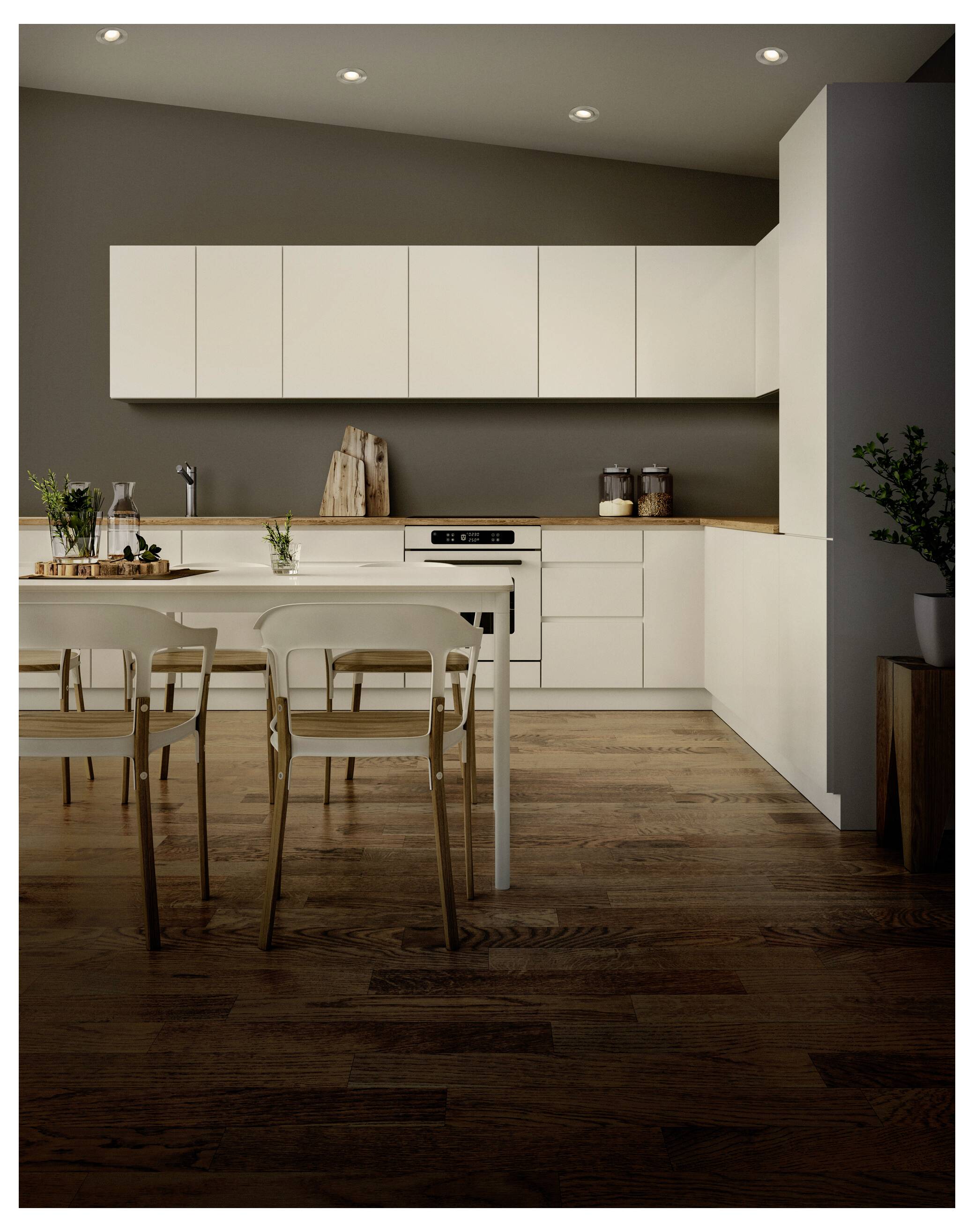 A modern kitchen with white cabinets, a wooden countertop, and wooden flooring. It features a dining table with four chairs and potted plants.