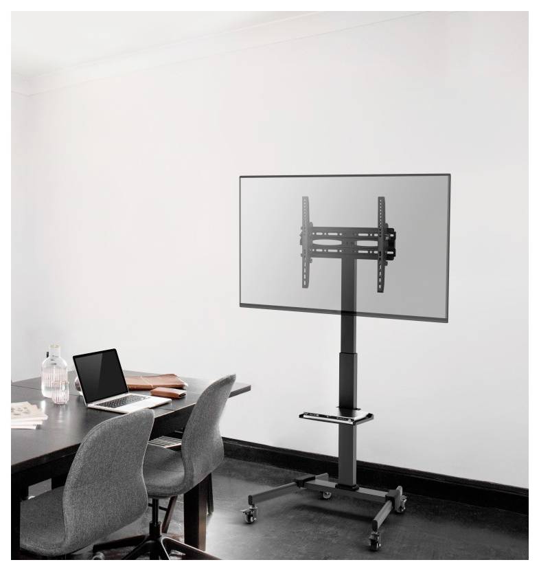 A modern conference room with a mounted flat-screen TV on a wheeled stand, a laptop on a table with chairs, and a minimalist decor.