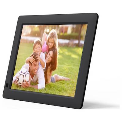 A family of four enjoys playing on a grassy field, with a father holding a soccer ball and children happily climbing on his back.