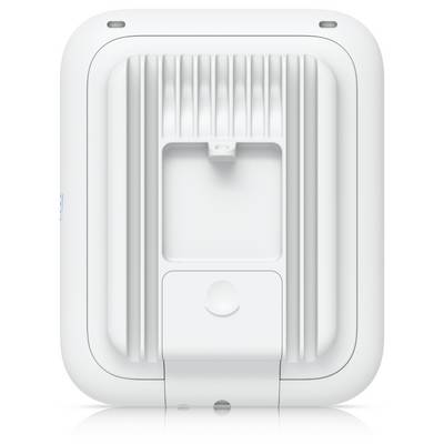 The image shows the back view of a white rectangular electronic device with a central recessed area and textured grooves.