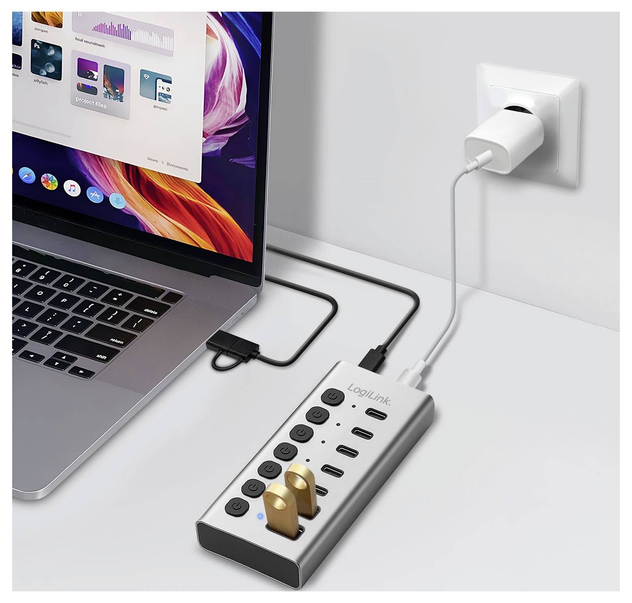 Laptop connected to a LQLink power strip hub with multiple USB ports and outlets, charging a laptop and other devices from a wall socket.