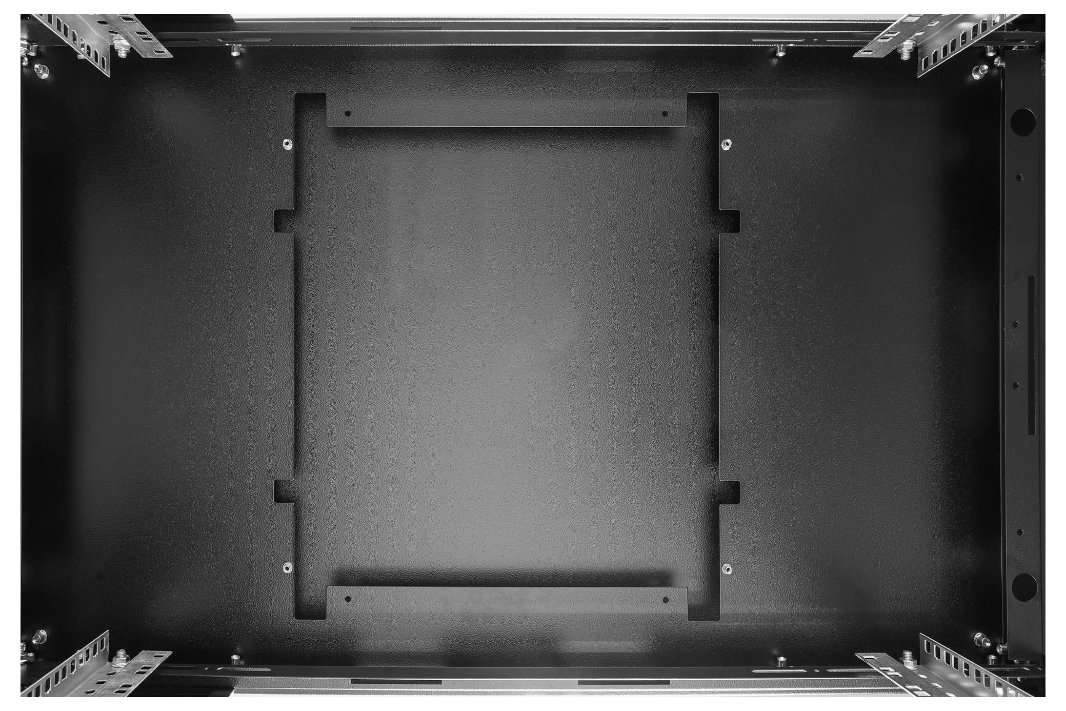 Empty metal server rack viewed from the top, showing mounting rails and empty space for equipment installation.