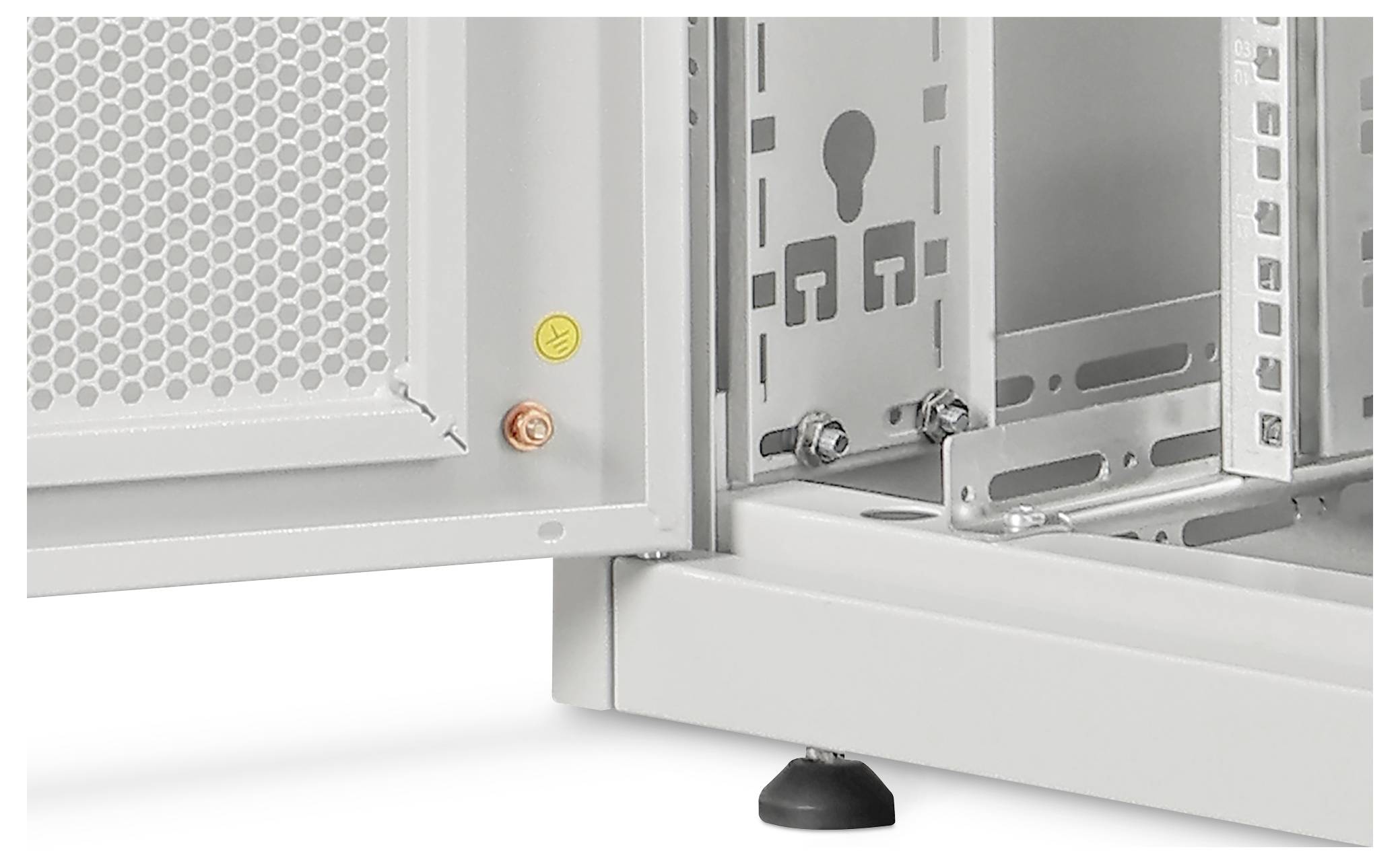 Close-up of a metal enclosure's corner, showing panel with screws and a ventilation grate, indicating hardware assembly or installation.