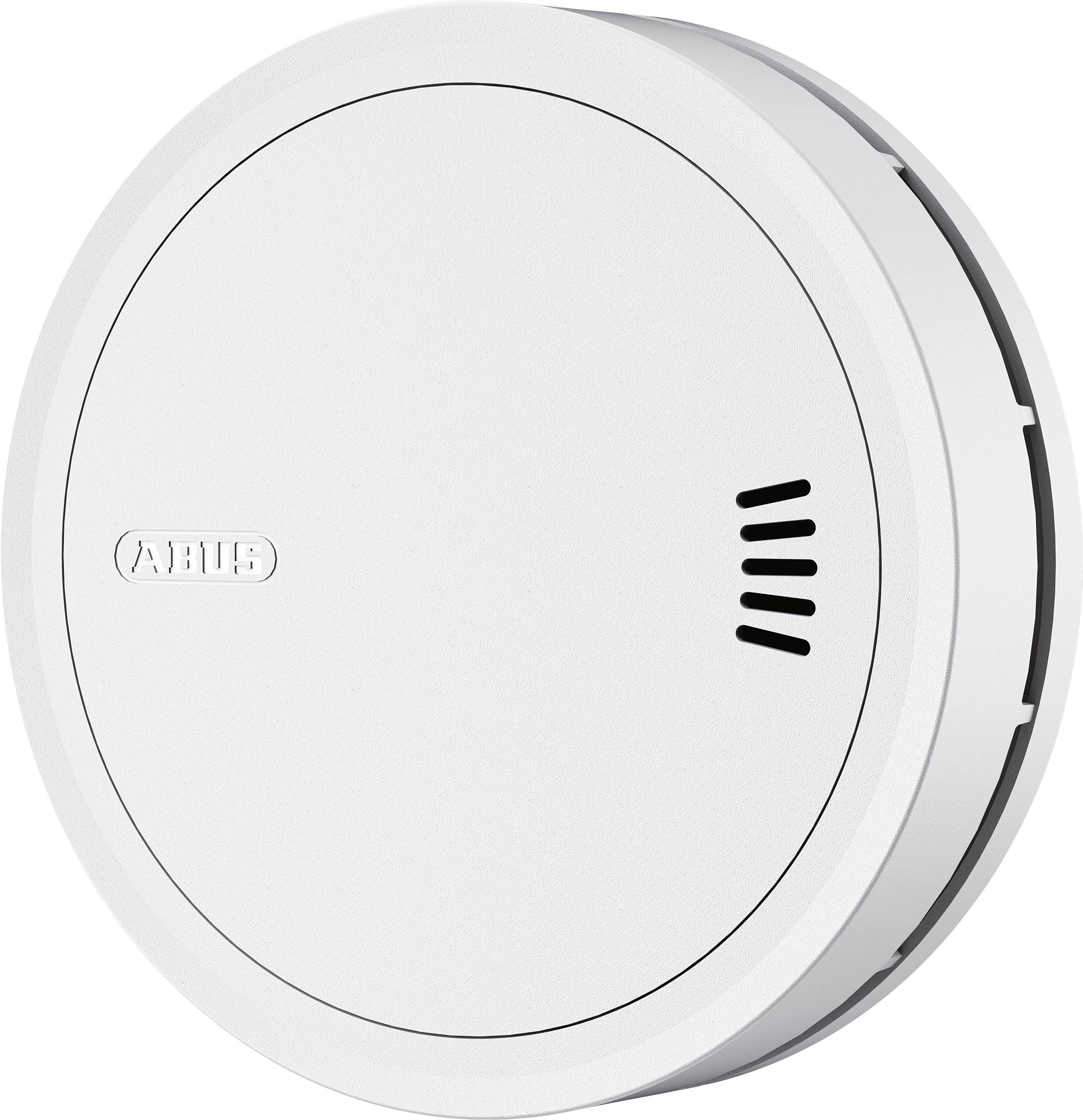 A white smoke detector with a round shape, ventilation slits, and a label on the side, designed for wall or ceiling mounting.
