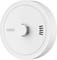 A round, white smoke detector with a central button and ventilation slots on the side, branded 'ABUS.'
