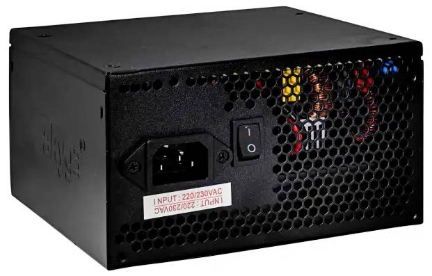 'A black computer power supply unit with perforated grille, power switch, and visible cables on the side. Rated input: 220/230 VAC.'