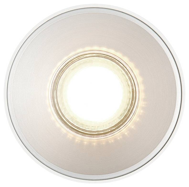 A round recessed LED ceiling light with a metallic trim, emitting a warm white glow, viewed from below.
