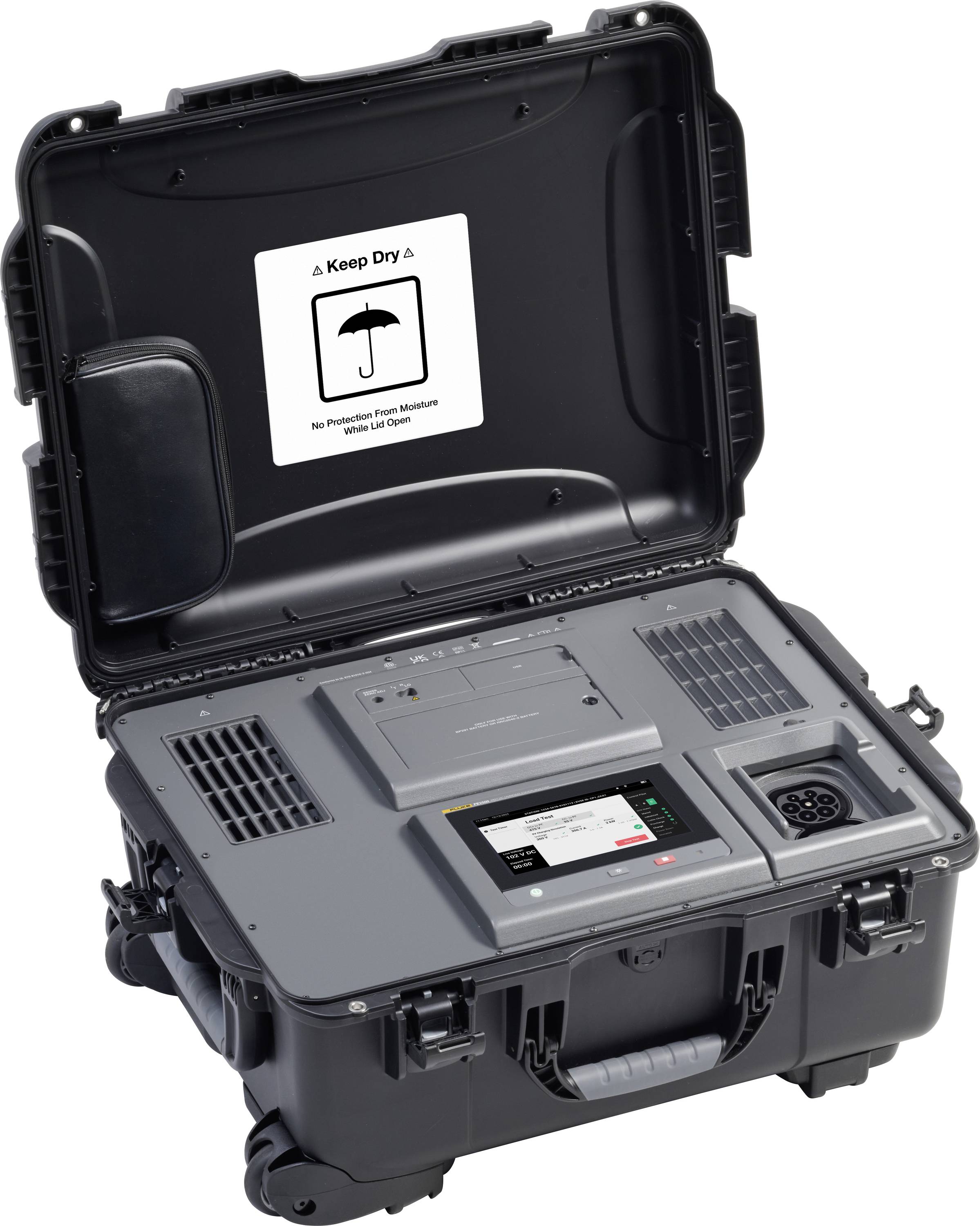 'Portable electronic equipment in an open rugged case, displaying various controls and a screen, with a 'Keep Dry' warning label inside.'