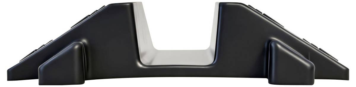 Black plastic cable ramp with a U-shaped center channel and sloped sides for routing and protecting cables across the floor.