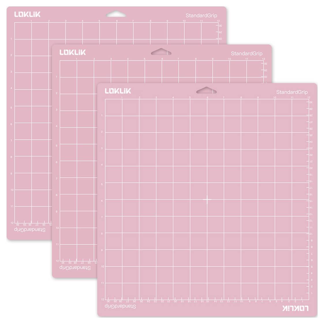 'Set of three pink cutting mats with grid pattern and 'StandardGrip' and 'LOKLIK' branding, used for crafting and cutting.'