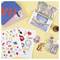 Stickers, notebooks, and phone cases with colorful designs are arranged on a yellow background.
