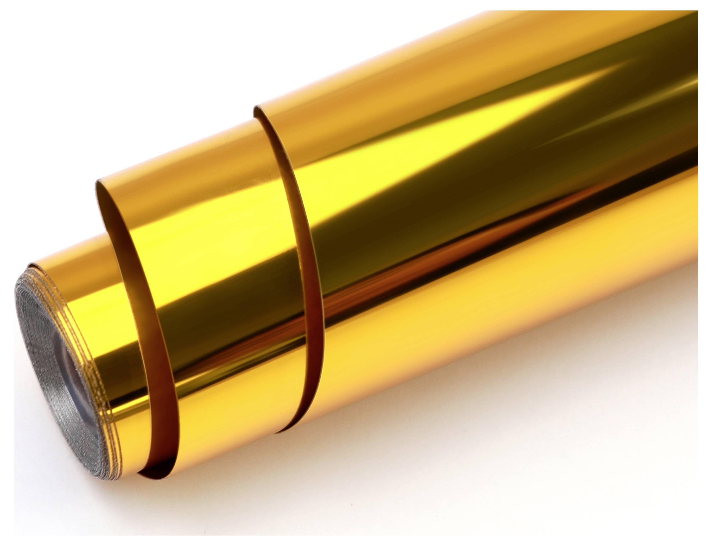 A roll of reflective golden material is partially unrolled, displaying its shiny surface.