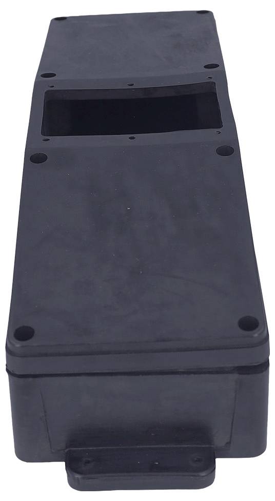 A black, rectangular box with a hollow section on top, featuring a flat, smooth surface and multiple screw holes on the front.