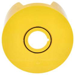 A yellow circular object with a central hollow opening sits on a white background. Its smooth surface and consistent color are prominent.
