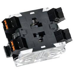 'Black and transparent relay switch with visible springs and terminals, used in electrical panels to control circuits.'
