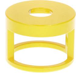 A yellow cylindrical object with an open middle and circular openings at the top and bottom, resembling a minimalist stool or stand.