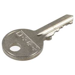 A metallic key with a round head and engraved code.