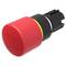 Red emergency stop button seen at an angle, highlighting its cylindrical shape and rotation arrows on the top surface for safety indication.