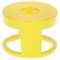 A bright yellow cylindrical object with a circular hole in the center and open sides, resembling a spool or bobbin-like structure.