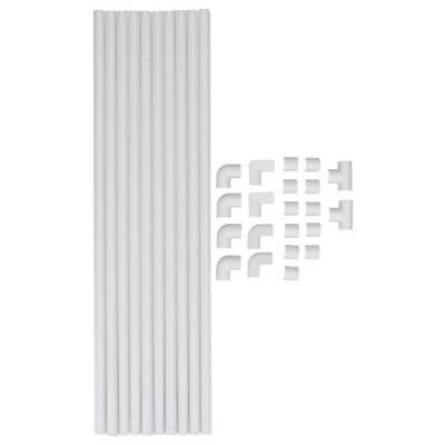 Ten white PVC pipes next to various white pipe connectors including elbows and couplings, arranged in an organized manner.