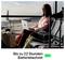 A woman sits with a laptop at the airport. Title at the bottom: 'Up to 22 hours battery life'. An aeroplane in the background.