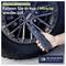 Handheld digital tire inflator being used on a car wheel; German text advertises ultra-fast inflation, 'Fahren Sie in nur 1 Minute wieder los', for tires 29 to 36 PSI.<br>