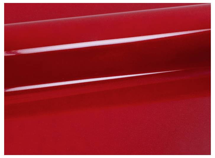 A smooth, shiny red surface with a slightly darker red shadow and light reflection, creating an abstract visual effect.