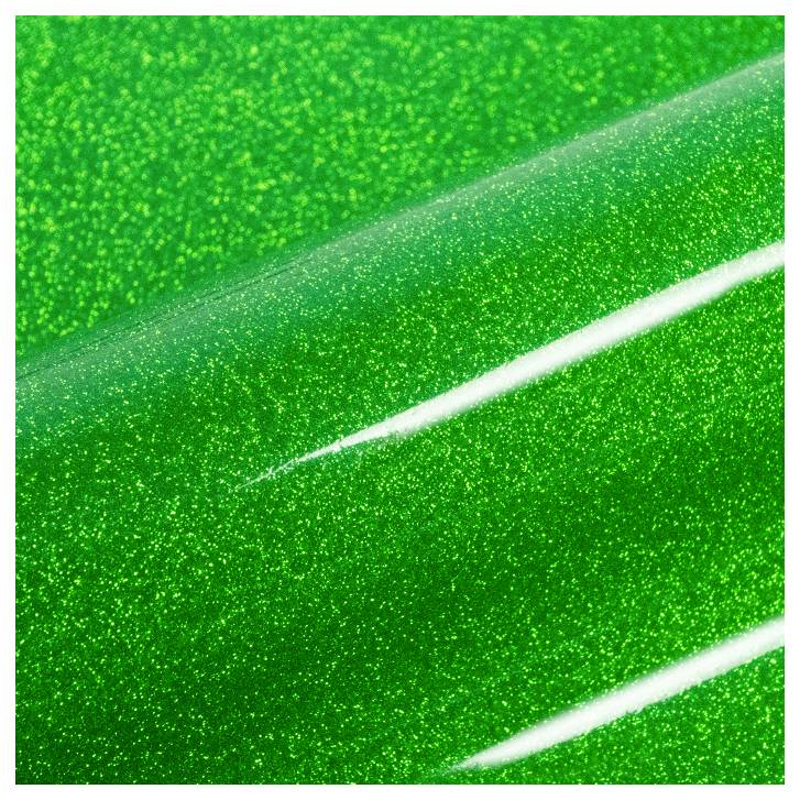 Close-up of a vibrant green glitter surface with a smooth, glossy texture and diagonal streaks creating a shimmering effect.