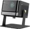 A black Dangbei projector with a modern design on a stand, featuring a lens and dtx speaker branding, suitable for home theater use.