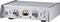 Silver audio amplifier with knobs for gain, impedance, EQ curve, and output selection. Central meter displays VU levels. Brand logo on left.