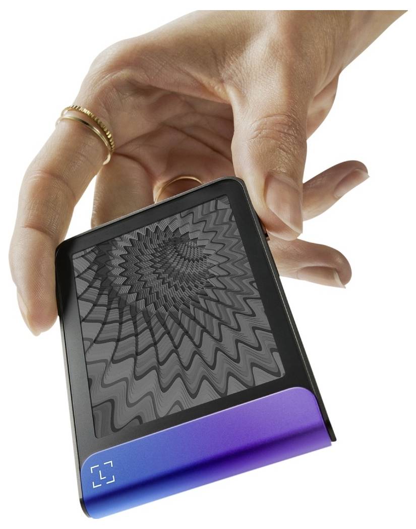 A hand holding a digital device with a geometric pattern on the screen and a gradient blue to purple border.