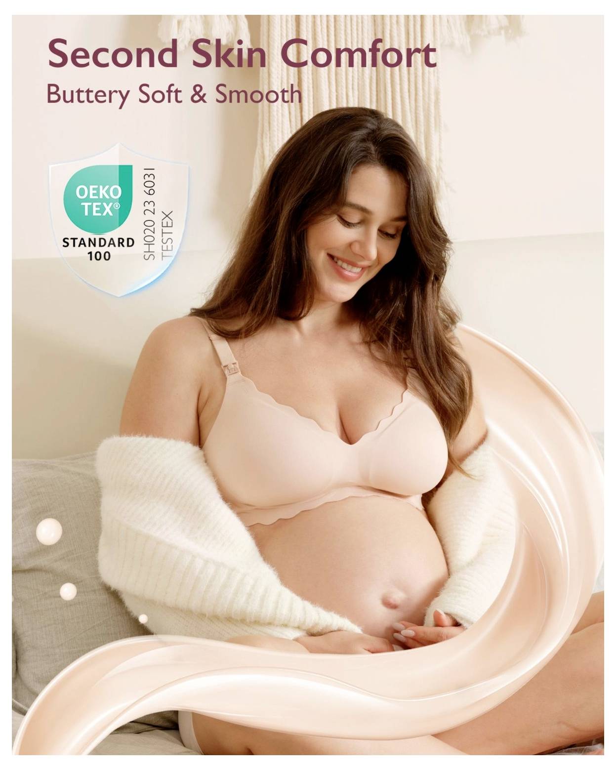 Pregnant woman smiling, wearing a soft bra and cozy cardigan. Text reads 'Second Skin Comfort' and 'Buttery Soft & Smooth'. Oeko-Tex certified.