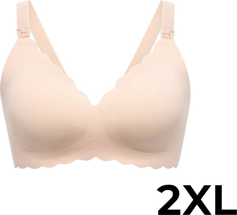 A light pink bra in a 2XL size, featuring scalloped edges and adjustable straps, displayed against a plain background.