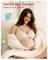 Pregnant woman smiling, seated in a peach bra with scalloped edges; text reads 'Second Skin Comfort' and 'Buttery Soft & Smooth'.