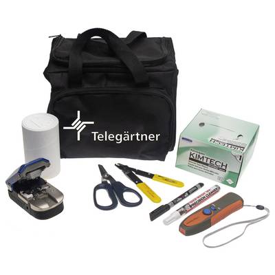 Telegärtner-branded tool kit bag with fiber-optic tools, including a cleaver, scissors, strippers, markers, and Kimtech wipes box.<br>