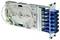 Fiber optic patch panel with multiple blue connectors on the right and coiled green cable storage inside the housing.
