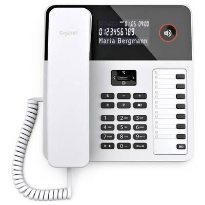 A white office landline phone with digital display showing 'Maria Bergmann' and the number '0123456789', featuring numeric keypad and function buttons.