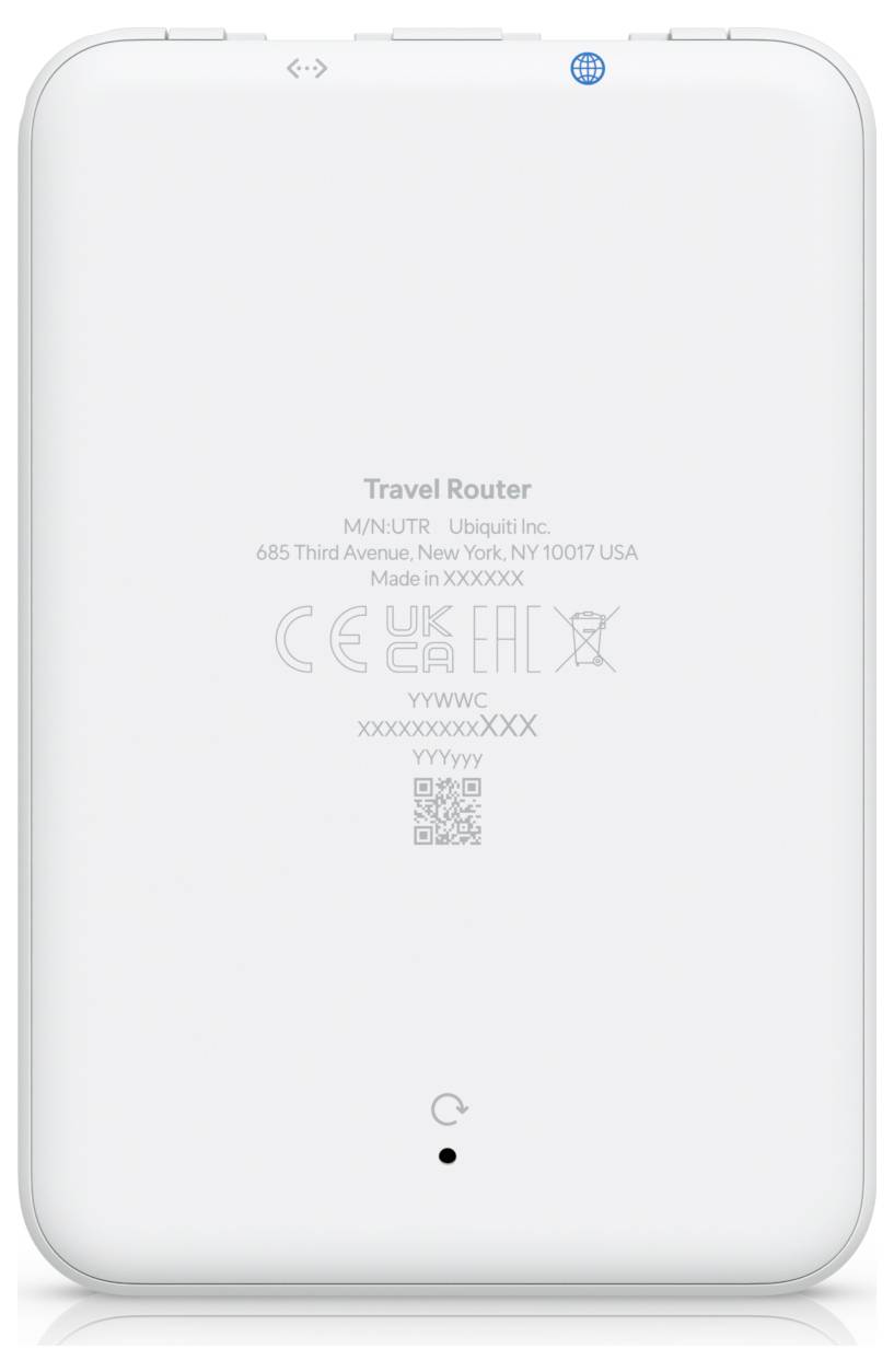 Back view of a white travel router showing manufacturer details and compliance logos, including CE and UKCA markings.