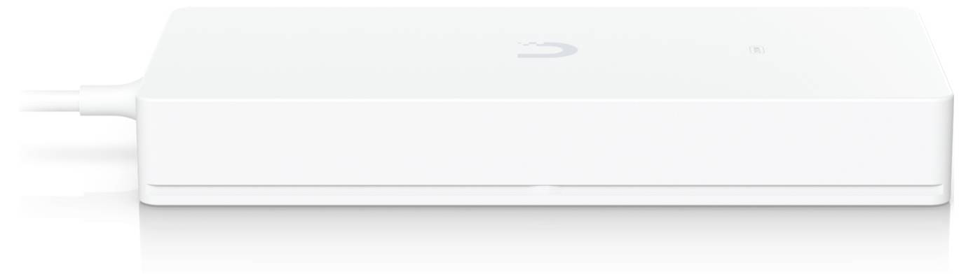 A sleek white external hard drive with a USB connection is on a white surface. The drive features a minimalistic design.