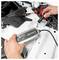 A person is connecting a CTEK battery charger to a car battery, with red and black cables visible. The car hood is open.