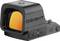 A black reflex sight with an orange-tinted lens, featuring control buttons on the side for adjusting settings.