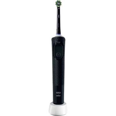 Electric toothbrush with a black, textured grip, brand logo at base, standing upright on a white charging station.