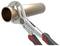 Adjustable wrench gripping a copper pipe, demonstrating its use in plumbing or construction tasks. Handles feature red and black grips.
